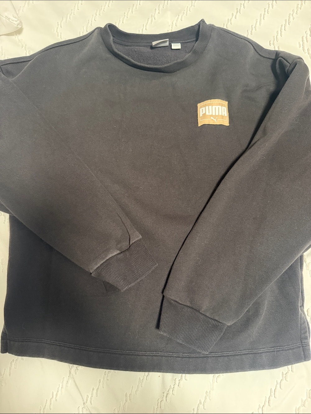 PUMA women’s Black Crewneck Sweatshirt with Subtle Puma Logo